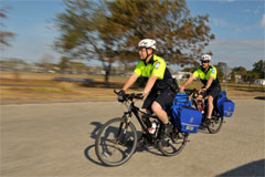 Two Police officers riding mountain bikes